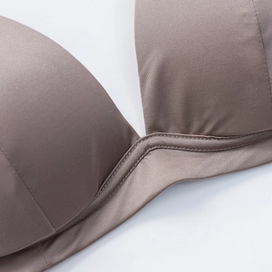 Coffee brown wireless triangle bralette with smooth silk-like fabric and reinforced stitching