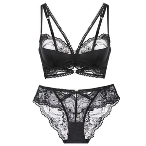 Lace lingerie set with multi-strap bra and matching panties in elegant black floral mesh