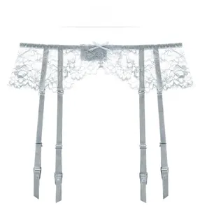 Detail of light gray floral lace garter belt with a small bow and adjustable straps