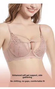 Detail view of pink lace bra featuring high soft bone support and side collection