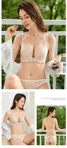 Dettaglio completo di lingerie in pizzo beige con chiusura frontale e spalline incrociate