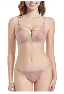 Close-up of floral embroidery lace lingerie set with strappy details in dusty rose