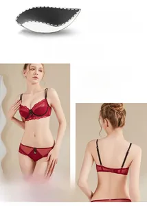 Detailweergave van wijnrode kanten lingerieset met strikjes en bloemige kanten texturen