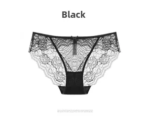 Close-up of black floral lace underwear with sheer mesh and a decorative center bow