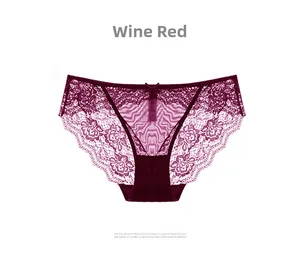 Detail of wine red lace underwear with sheer mesh and a small decorative bow