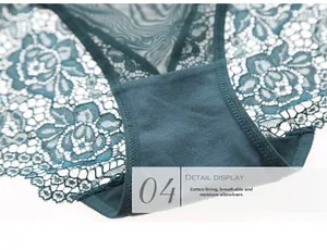 Detail view of dark green floral lace panties with breathable cotton crotch lining