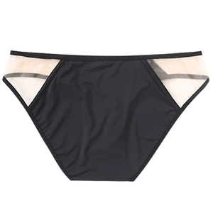 Detailed view of women's black low-rise thong with sheer mesh side panels and smooth fabric