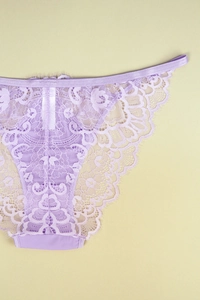 Detailed view of lavender sheer floral lace and eyelash trim on these women's panties