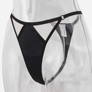 Detailed macro view of black thong featuring contrast panels and elegant side metal ring