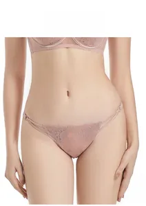 Close-up of pink sheer floral lace embroidery on low-rise thong with side straps