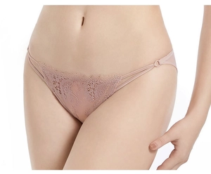 Detailed view of sheer floral lace embroidery and dual side straps on low-rise panties
