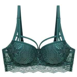Deep green lace push up bra with floral pattern and cage strap detail on white background