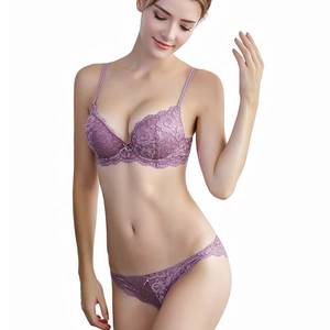 Elegant purple lace lingerie set featuring a push-up bra and matching floral panties