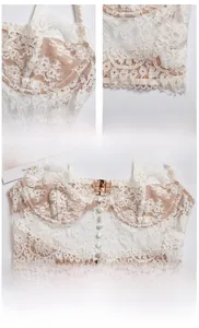 Detailed view of white French eyelash lace bra with floral patterns and sheer mesh design