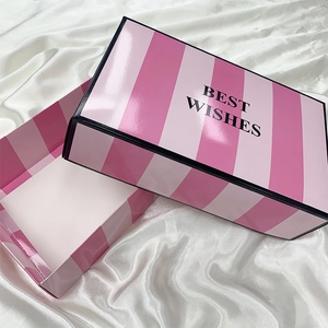 Pink striped luxury gift box for lingerie with Best Wishes text on satin background