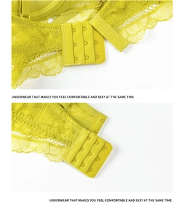 Détail de soutien-gorge en dentelle jaune avec bretelles réglables et agrafage à 3 rangées