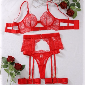 Four-piece red lace lingerie set with floral patterns and matching garter belt