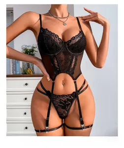 Detailed embroidery lace pattern and silver metal fastener on black lingerie set