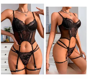 Detailed view of black lace lingerie set with sheer mesh cups and adjustable garter straps