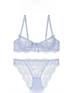 Close-up of lavender purple floral lace lingerie set with sheer embroidery and bow detail