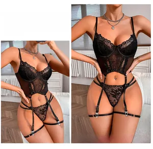 Detail view of black lace lingerie set with sheer embroidery and adjustable leg garter straps