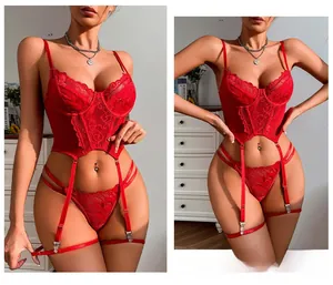 Detail of red floral lace lingerie set featuring adjustable garter belts and sheer mesh