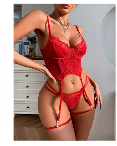 Detailed view of red floral lace bra and high waist garter belt with adjustable straps