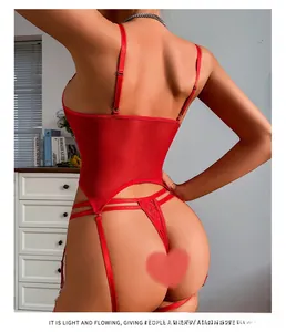 Close-up of red sheer mesh and floral lace lingerie with adjustable straps and texture