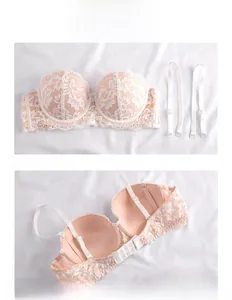 Detail showing the floral lace pattern and multi-row back closure of the pink bra
