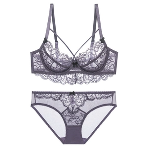 French lace lingerie set in lavender purple with delicate black bow and mesh underwear