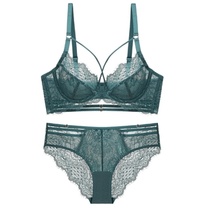 Elegant emerald green lace lingerie set featuring a wired bra and matching panties