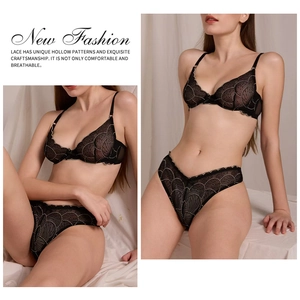 Close-up of black floral lace embroidery detail and sheer fabric on a sexy French style bra