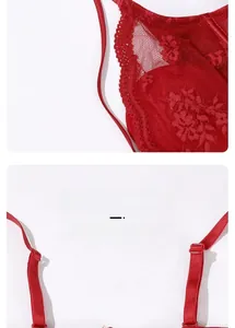 Detail showing the floral red lace fabric and adjustable thin back straps of the bra