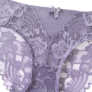 Elegant purple lace panties with floral embroidery and a small satin bow detail