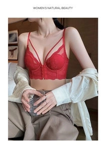 Detailed macro shot of red floral lace bra featuring decorative double straps and texture