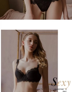 Detail of elegant black eyelash lace lingerie set with scalloped edges and sheer texture