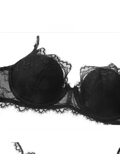 Detail of sheer black floral lace bra with intricate eyelash trim and mesh texture
