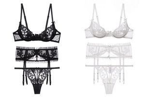 Dettagli di ricami in pizzo e mesh dei completi di lingerie sexy neri e bianchi