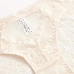 Lace panties in beige with floral jacquard and breathable sheer fabric detail