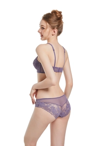 Detailed back view of purple floral lace lingerie set with mesh details on white background