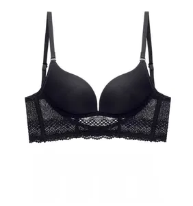 Detail showing the black lace wings and smooth molded cup of this push-up bra set