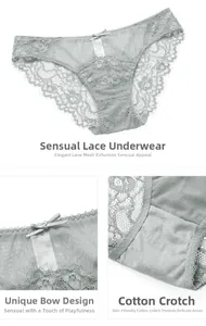 Detailed view of light blue lace panties with delicate bow and cotton lining insert