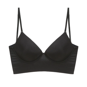 Macro shot of smooth seamless black longline bra featuring thin straps and matte finish