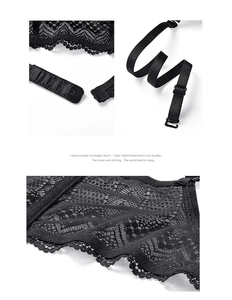 Detail of black floral lace bra featuring a multi-row hook closure and adjustable straps