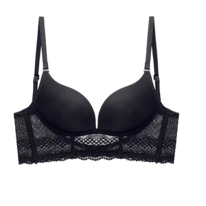 Seamless black push-up bra with lace underband and adjustable straps on white background