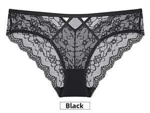 Detail view of black French lace panties with floral embroidery and V-shaped cross straps