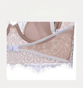 Detail of eyelash lace bra featuring breathable cups and a double row back hook closure