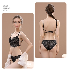 Close-up of black eyelash lace lingerie set featuring delicate mesh and scalloped edges