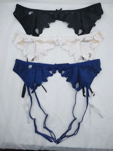 Detailed embroidery lace garter belt set with floral patterns and adjustable straps