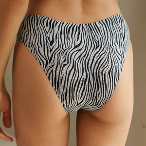 Close-up of zebra print panties featuring a high-cut design and breathable fabric texture